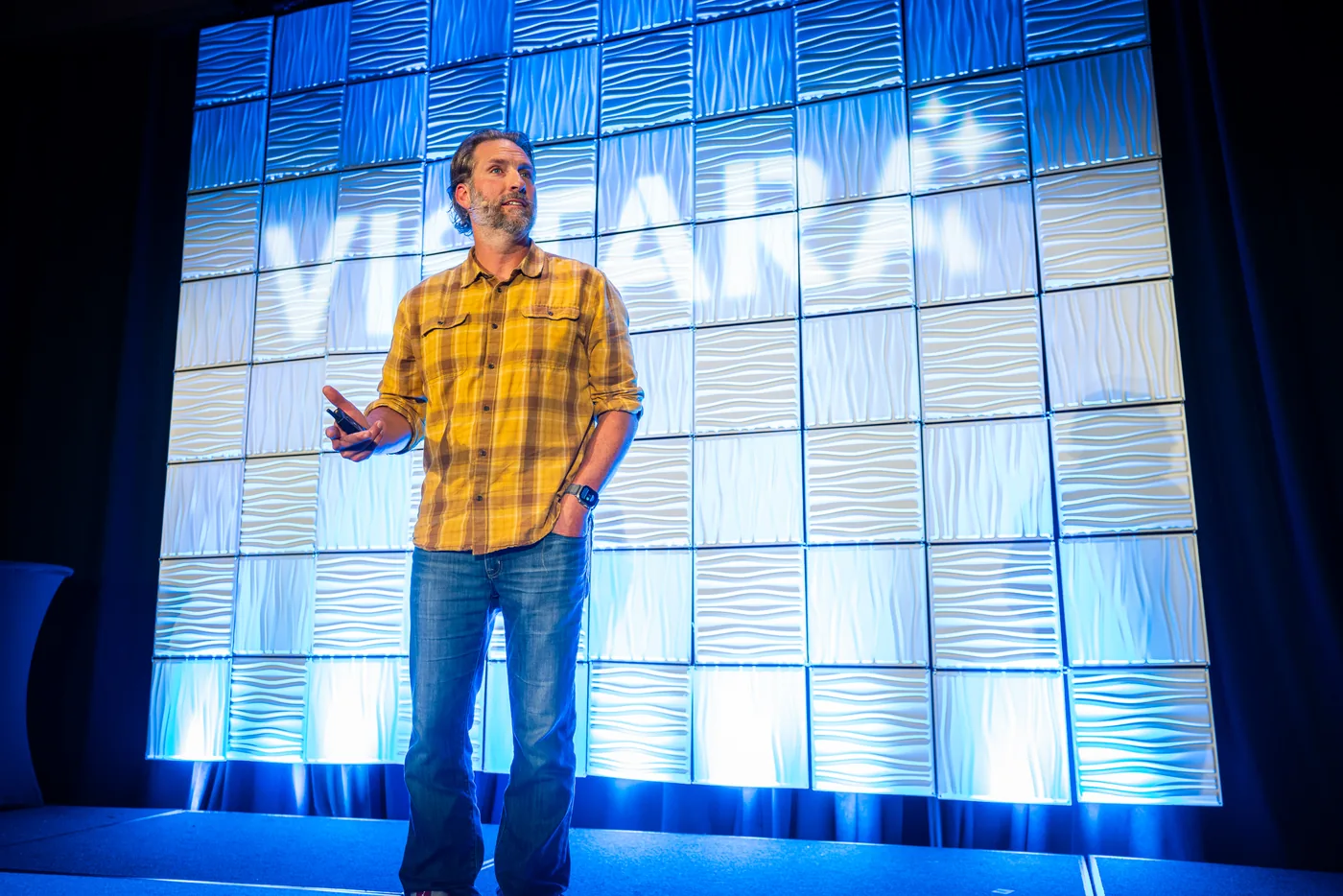 Jason Swenk speaking on stage